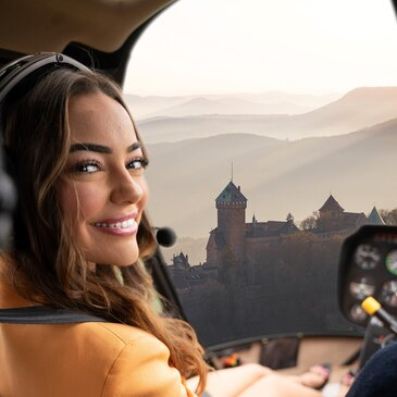 Baptême en Hélicoptère - Survol du Haut-Kœnigsbourg en région Alsace Baptême en Hélicoptère - Survol du Haut-Kœnigsbourg en région Alsace