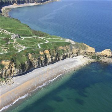 Baptême en Hélicoptère - Survol des Plages du Débarquement Baptême en Hélicoptère - Survol des Plages du Débarquement